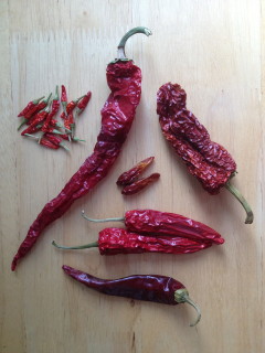 A variety of dried red chili peppers.